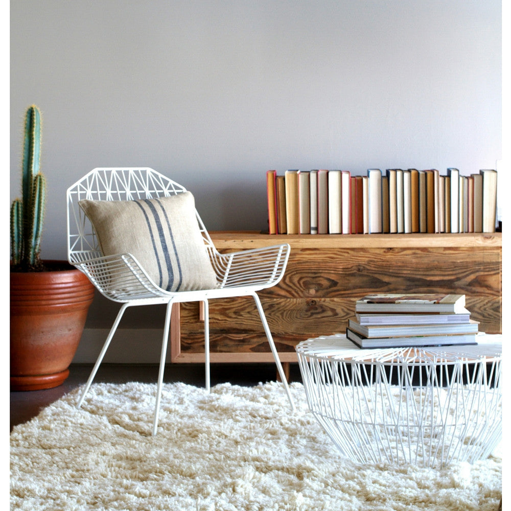 Bend White Farmhouse Chair in Room with Drum Table