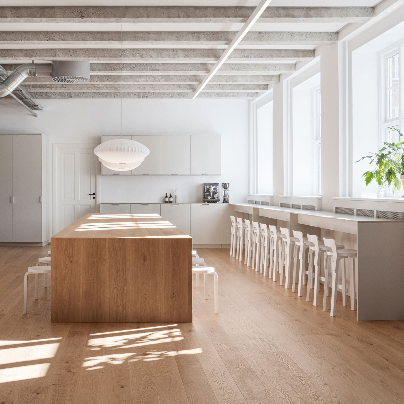 Artek Alvar Aalto Stool 60s and K65 Stools in Work and Co Office with Natural Light