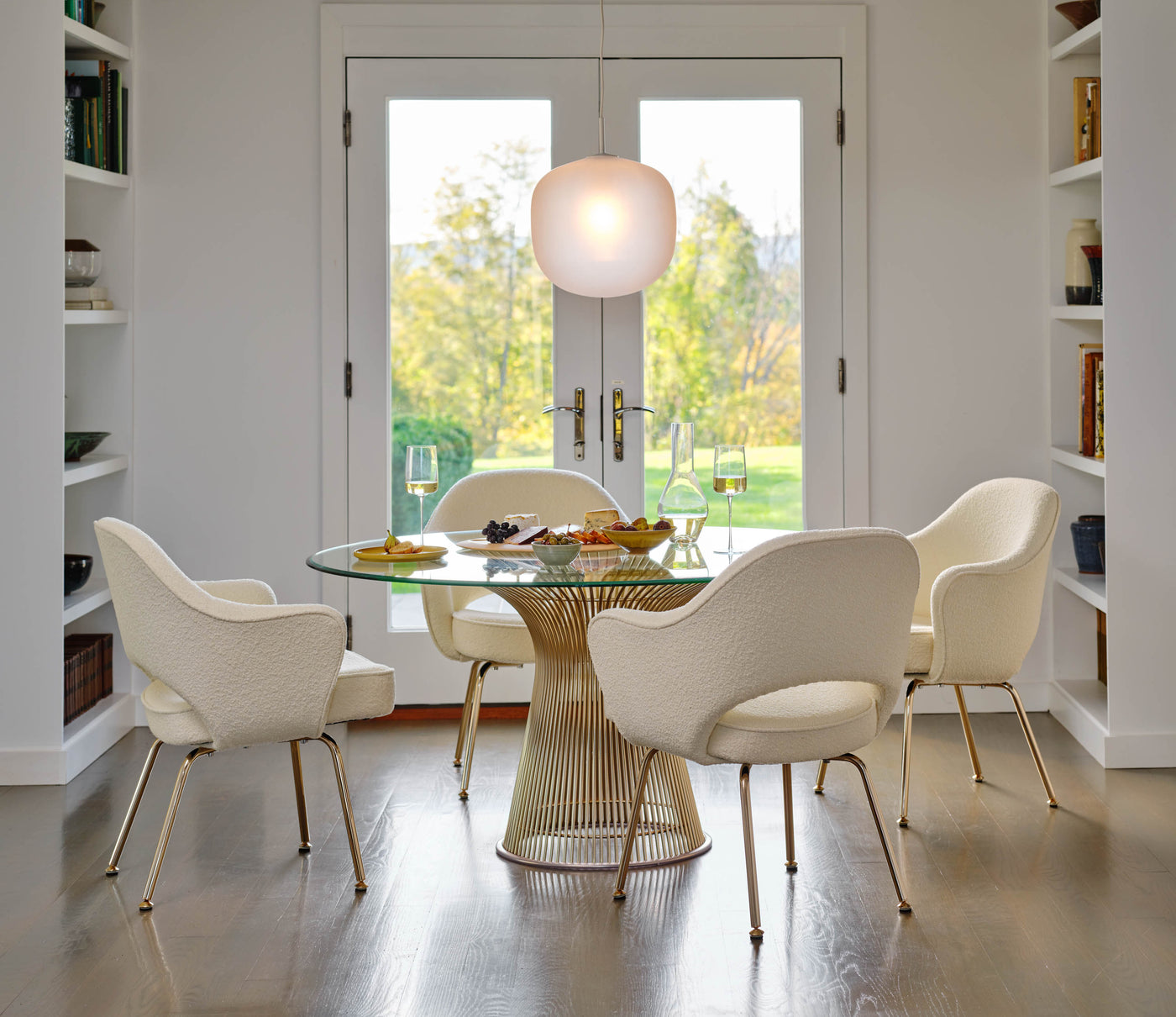 Knoll Platner Dining Table Gold with Saarinen Executive Armchairs and Rime Pendant Light