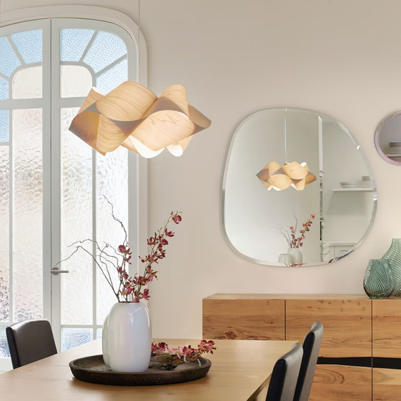 LZF Swirl Pendant Light in Cozy Valencia Dining Room with Mirror