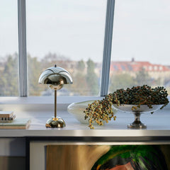 andTradition VP9 Flowerpot Lamp Brass Plated in Copenhagen Loft Window