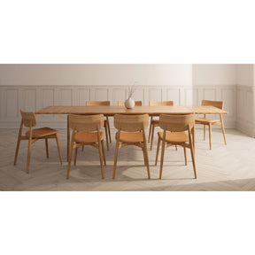 bruunmunch Chiara Dining Chairs with Davos Brandy Leather Seats with the Pure Dining Table