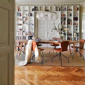 Bruunmunch PLAYDinner Lame Dining Table in Copenhagen Apartment with PLAYSwing chairs