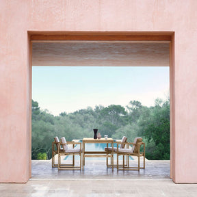 Carl Hansen BK10 Teak Dinings and BK15 Dining Table  Overlooking Pool from Rose colored Adobe House