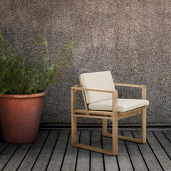 Carl Hansen BK10 Teak Dining Chair with Cushions Outdoors with Plant at Danish Summer House