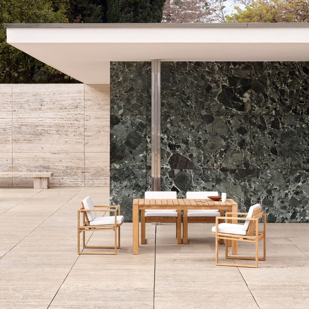 Carl Hansen BK10 Dining Chairs and BK15 Dining Table on Modern Home Deck by Verdi Alpi Marble Wall