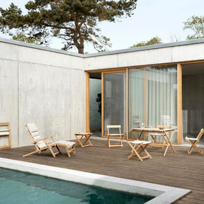 Carl Hansen Borge Mogensen Teak Outdoor Collection by Pool in Courtyard of Modern Danish Home