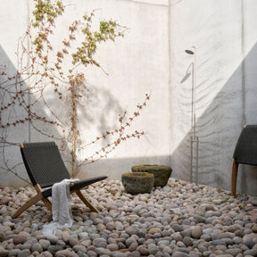 Carl Hansen Cuba Outdoor Chair Teak with Charcoal Rope MG501 in Stony Courtyard