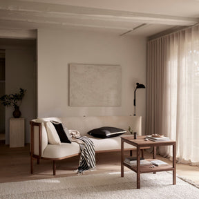 Carl Hansen RF1903 Sideways Sofa Walnut Oil with Pillows and Blankets in Living Room with Filtered Light