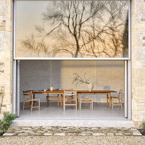 Carl Hansen Wegner CH53 Foot Stool by Hans Wegner in Danish Summer House Indoor Outdoor Dining Room