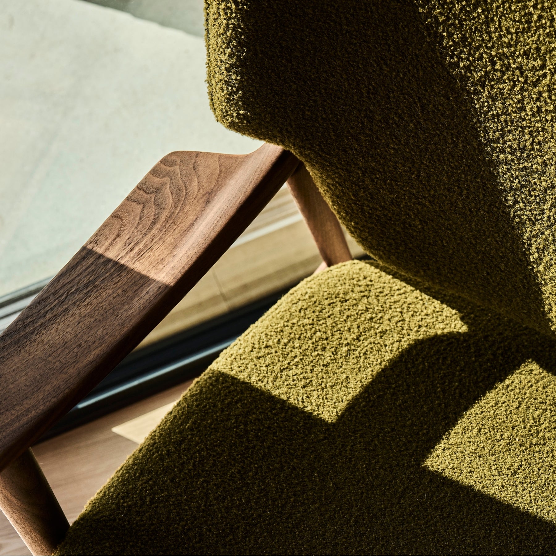 Eikund Veng Lounge Chair Walnut Frame with kvadrat Baru 950 olive green boucle fabric