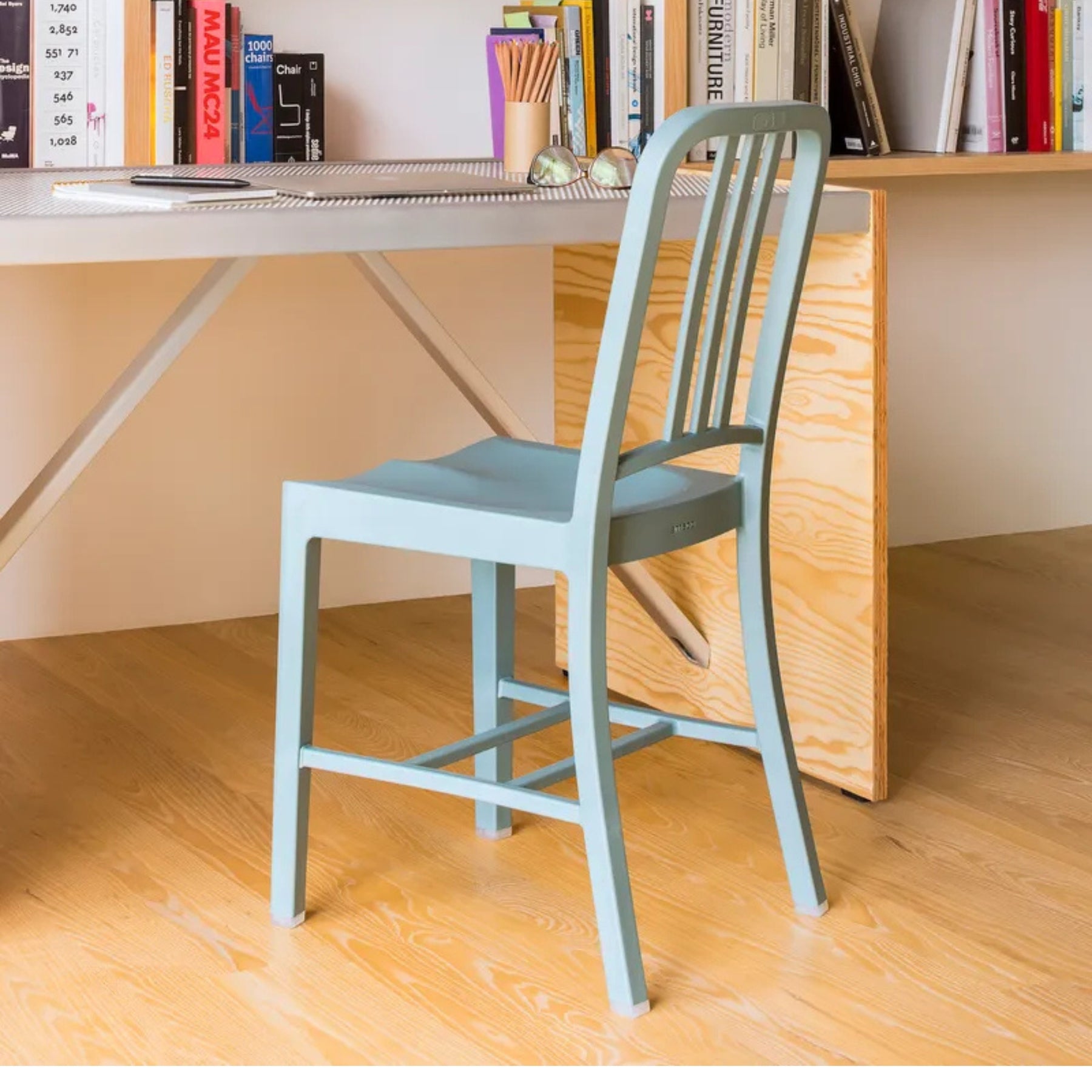 Emeco 111 Navy Chair Light Blue at Desk