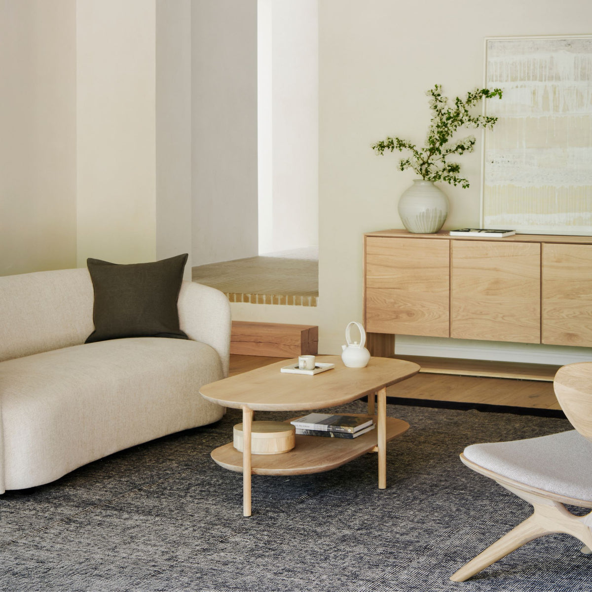 Ethnicraft Bok Coffee Table in Living Room with Ellipse Sofa and Nordic Sideboard