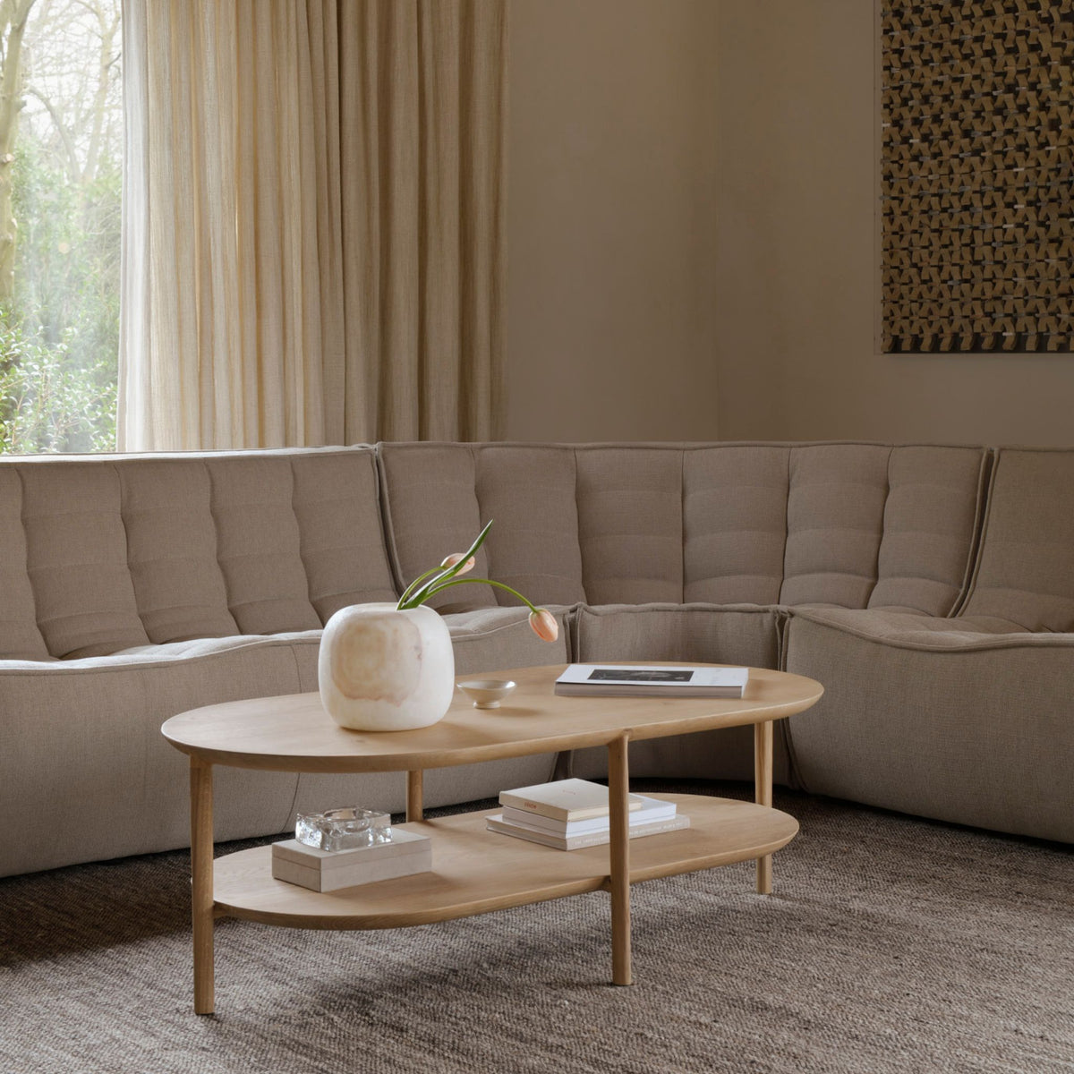 Ethnicraft Oak Bok Coffee Table Oval with Shelf in Living Room with N701 Sofa