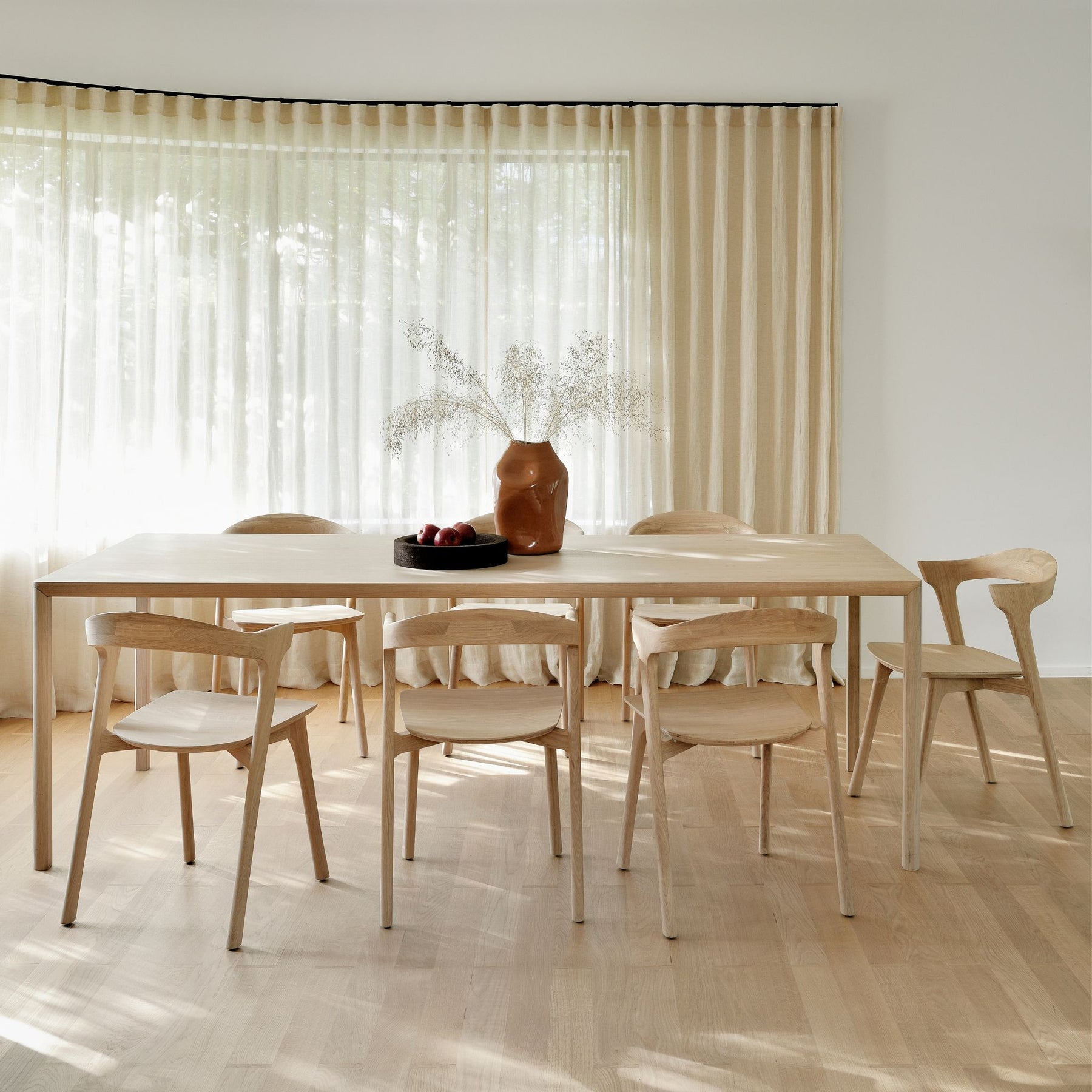 Ethnicraft Oak Bok Dining Chairs in Dining Room with Filtered Light