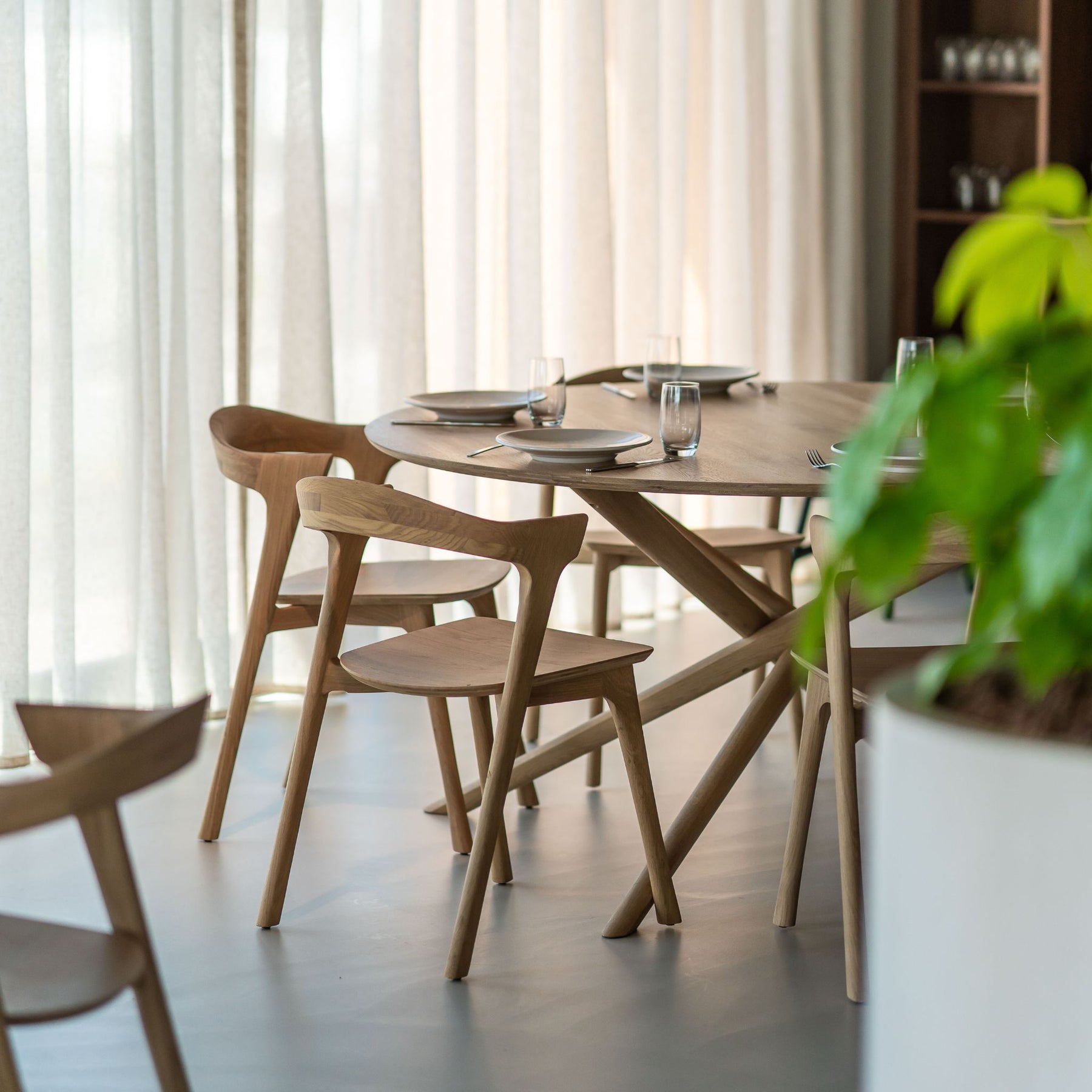 Ethnicraft Oak Bok Dining Chairs with Round Mikado Dining Table