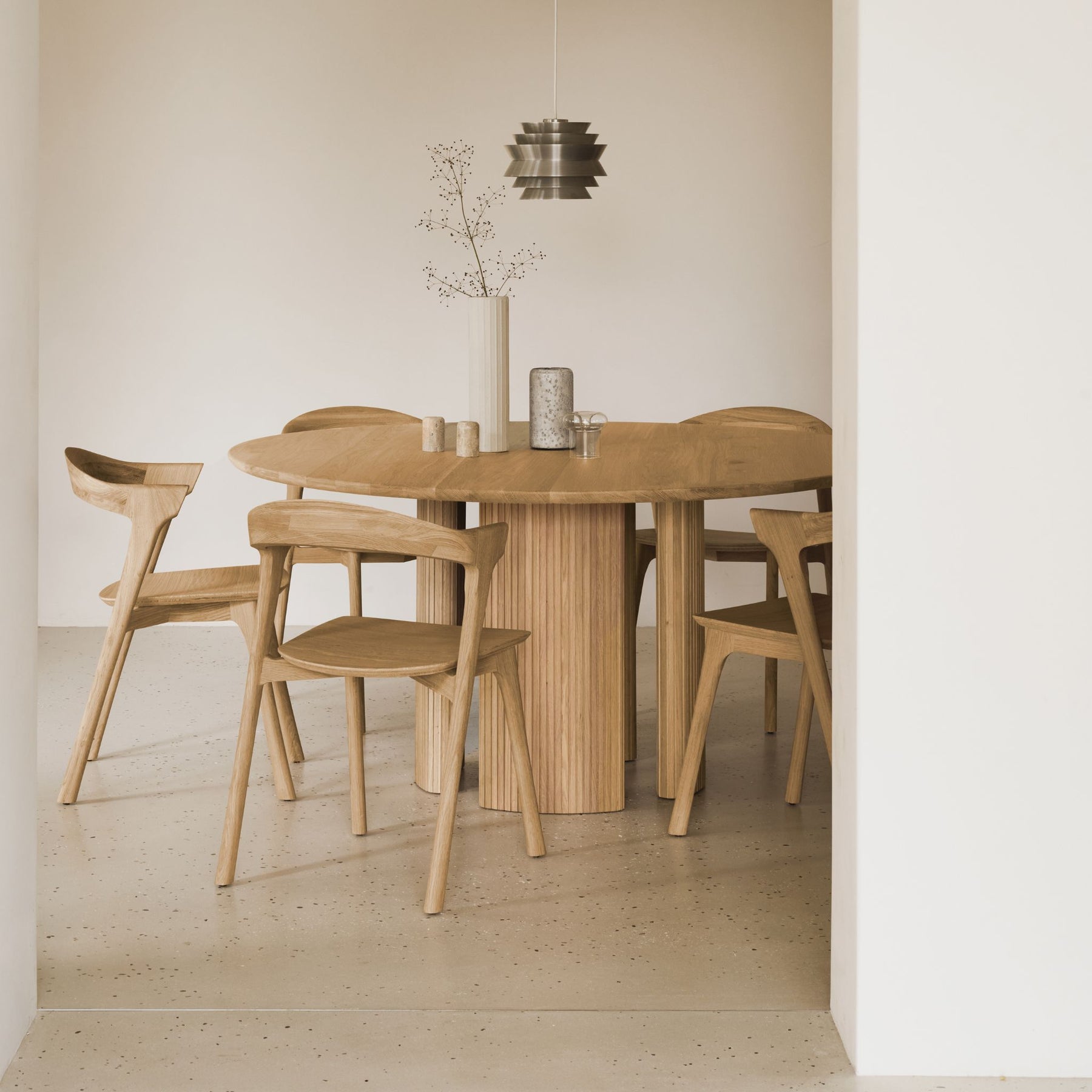 Ethnicraft Oak Bok Dining Chairs in Dining Room with Round Roller Max Dining Table