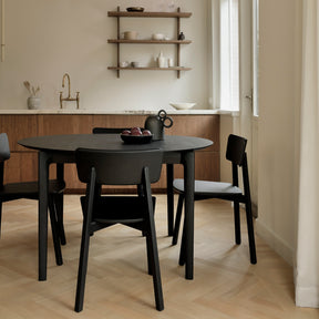 Ethnicraft Black Oak Bok Round Extendable Dining Table 51528 in Kitchen with Black Oak Casale Dining Chairs