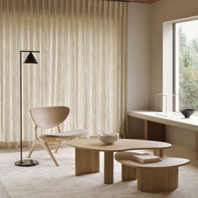 Ethnicraft Oak Boomerang Coffee Tables Nested in Living Room with Eye Lounge Chair and Flos Anastassiades Floor Lamp