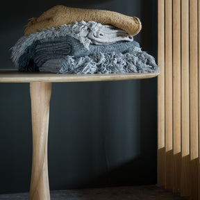 Ethnicraft Oak Torsion Dining Table with Throw Blankets