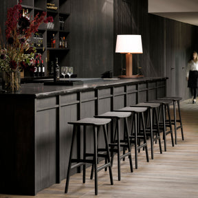 Ethnicraft Osso Counter Stools Black Oak in Hotel Bar