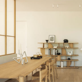 Ethnicraft Pi Dining Table and Chairs in Room with Oak Geometric Shelves