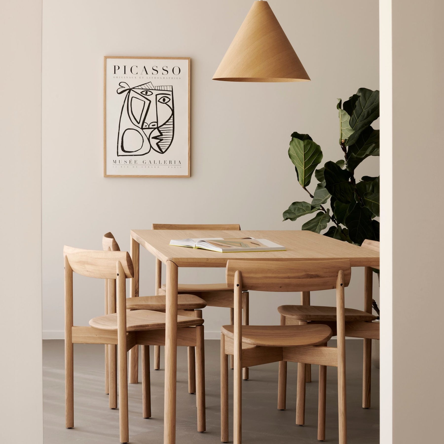 Ethnicraft Risu Dining Chairs in Dining Room with Fiddle Leaf Fig