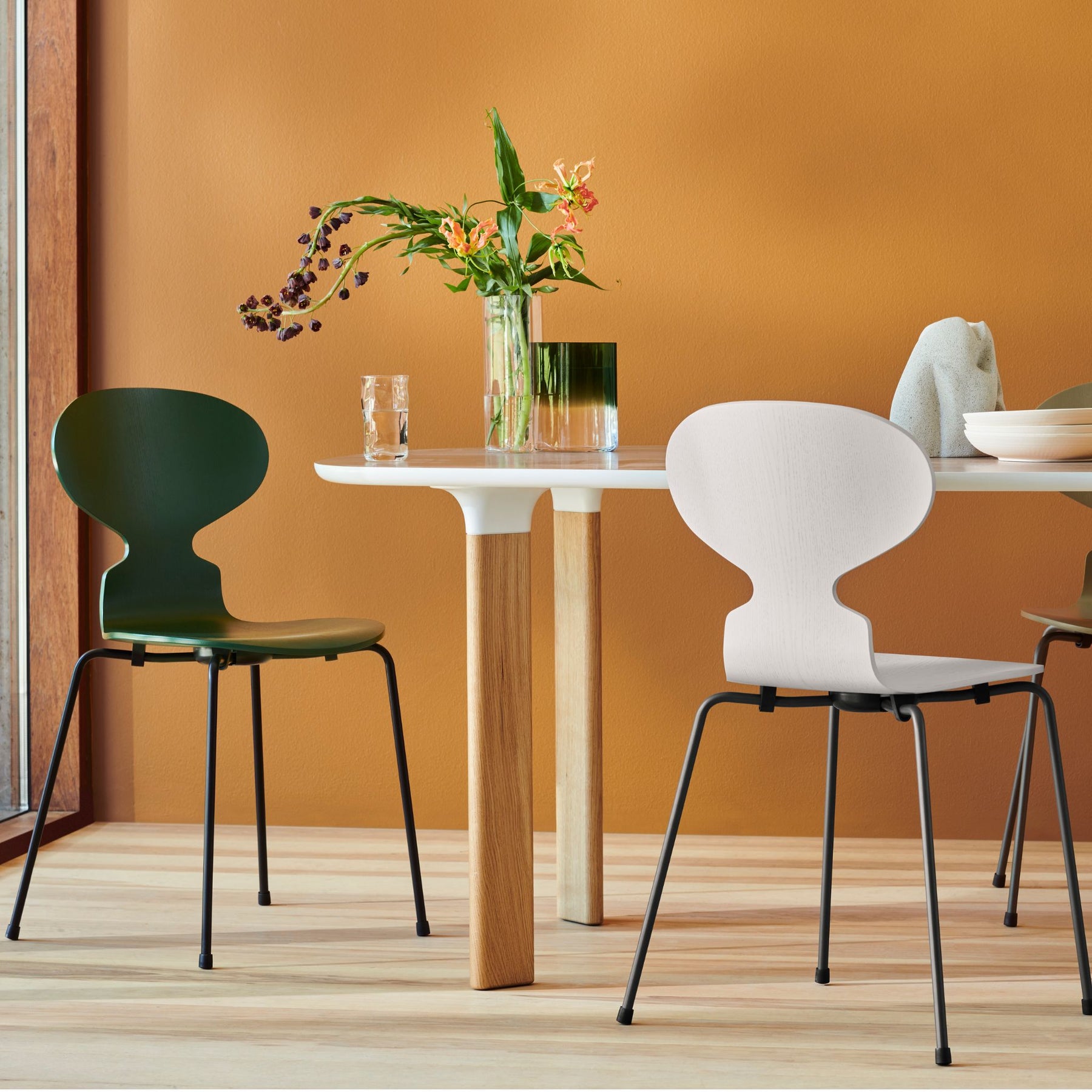 Fritz Hansen Ant Chairs Evergreen and White in Dining Room with Analog Table