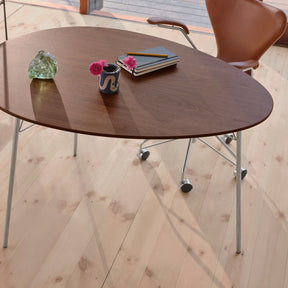 Fritz Hansen Egg Table  by Arne Jacobsen in Home Office with leather Series 7 Chair