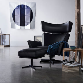 Fritz Hansen Oksen Chair and Ottoman Black Leather in Artist's Studio with Tray Table