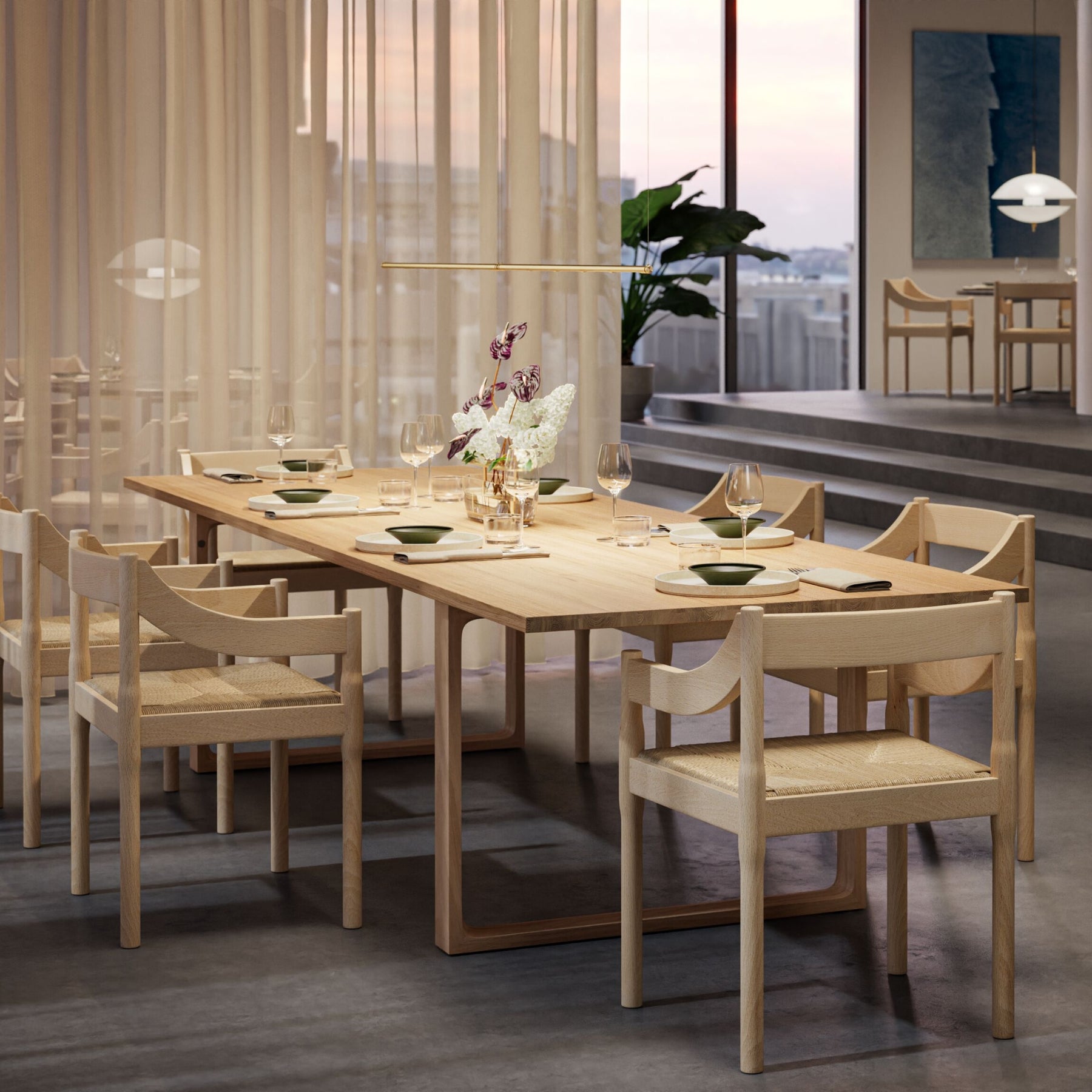 Fritz Hansen Carimate Chairs by Vico Magistretti Natural Beech in Restaurant with Essay Table
