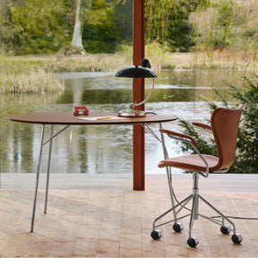 Fritz Hansen Egg Table  by Arne Jacobsen in Home Office with leather Series 7 Chair and Kaiser Idell Luxus Table Lamp