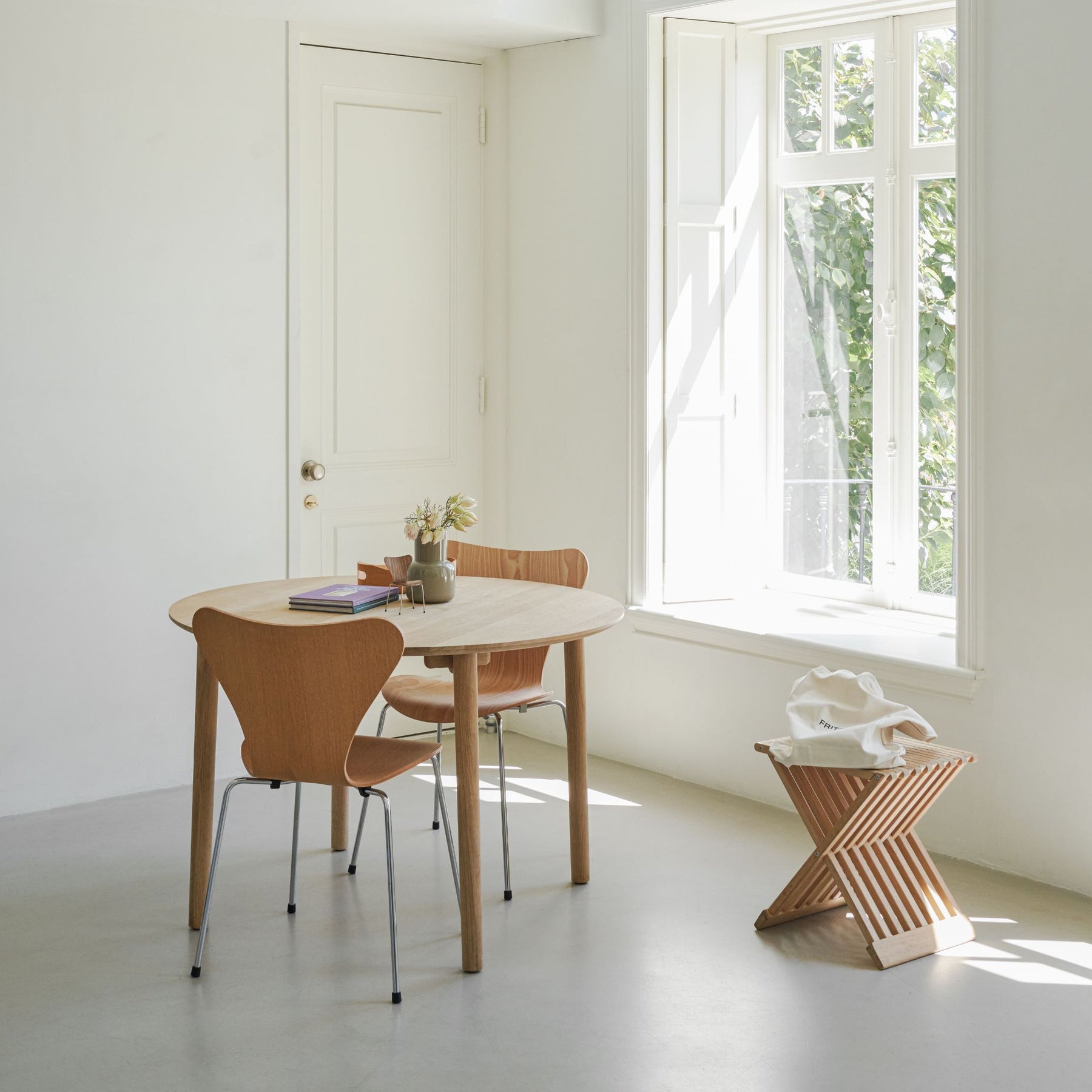 Fritz Hansen Hven Dining Table Round with Series 7 Chairs and Fionia Stool