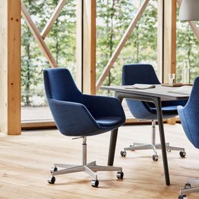 Fritz Hansen Little Giraffe Office Chairs Blue in Conference Room with Pluralis Table