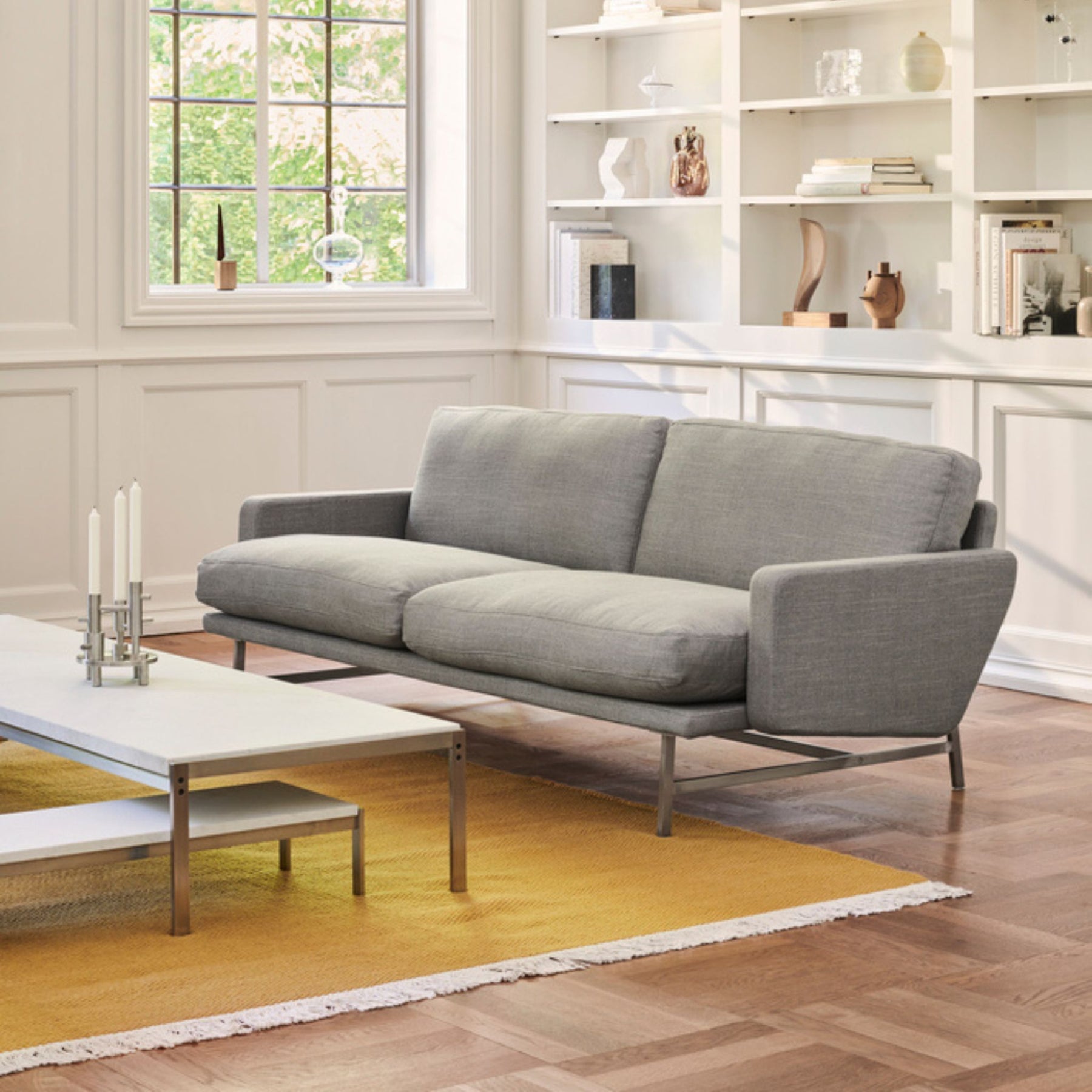 Fritz Hansen Lissoni Sofa in Living Room with Poul Kjaerholm Coffee Tables