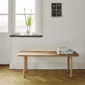 Fritz Hansen Skagerak Hven Bench with leather cushion by window in Copenhagen Apartment