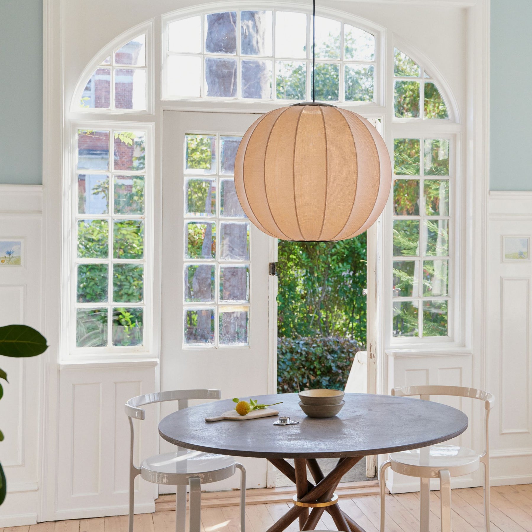 Knit Wit Pendant Light 60 in Sandstone over Round Table by Window in Copenhagen partment