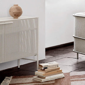 Kristina Dam Studio Grid Sideboard Beige with Books and Rug