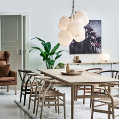 Le Klint Bouquet Chandelier 5 Shades Large in Dining Room with Hans Wegner Wishbone Chairs and Dining Table