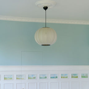 Made by Hand Knit Wit Pendant Pearl in Room with Robins Egg Blue Walls and Hand Painted Mini Murals