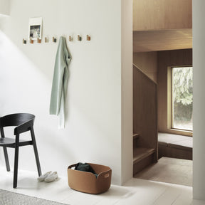 Muuto Cover Armchair Black in Entry Way with Attach Coat Hooks