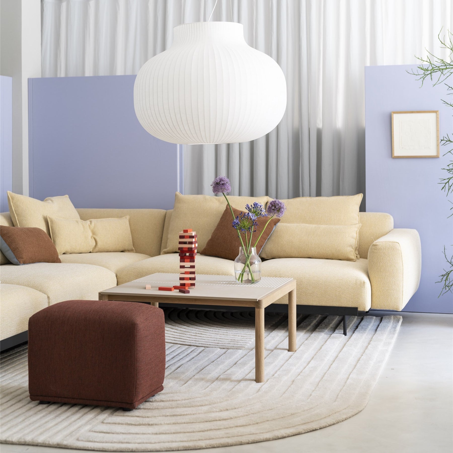 Muuto In Situ Modular Sofa in room with Strand Pendant and Revelo Rug