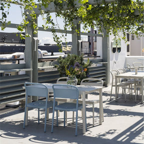 Muuto Linear Steel Side Chairs and Dining Table Pale Blue and Grey on Rooftop Deck in Copenhagen