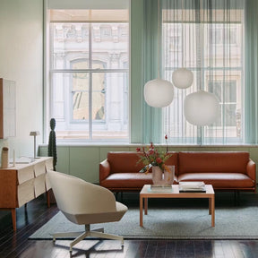 Muuto Oslo Swivel Chair in NY Apartment with Outline Sofa and Rime Pendants