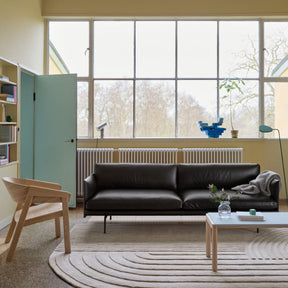 Muuto Outline Sofa Black Leather In Living Room with Cover Chair and Revelo Rug