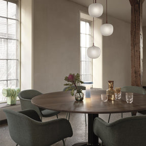 Muuto Rime Pendant Lights over Midst Dining Table with Fiber Soft Armchairs