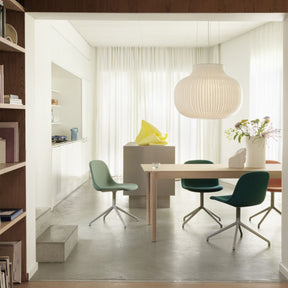 Muuto Strand Pendant Light over Dining Table with Fiber Side Chairs