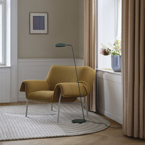 Muuto Wrap Lounge Chair in Copenhagen Living Room with Revelo Rug and Leaf Floor Lamp