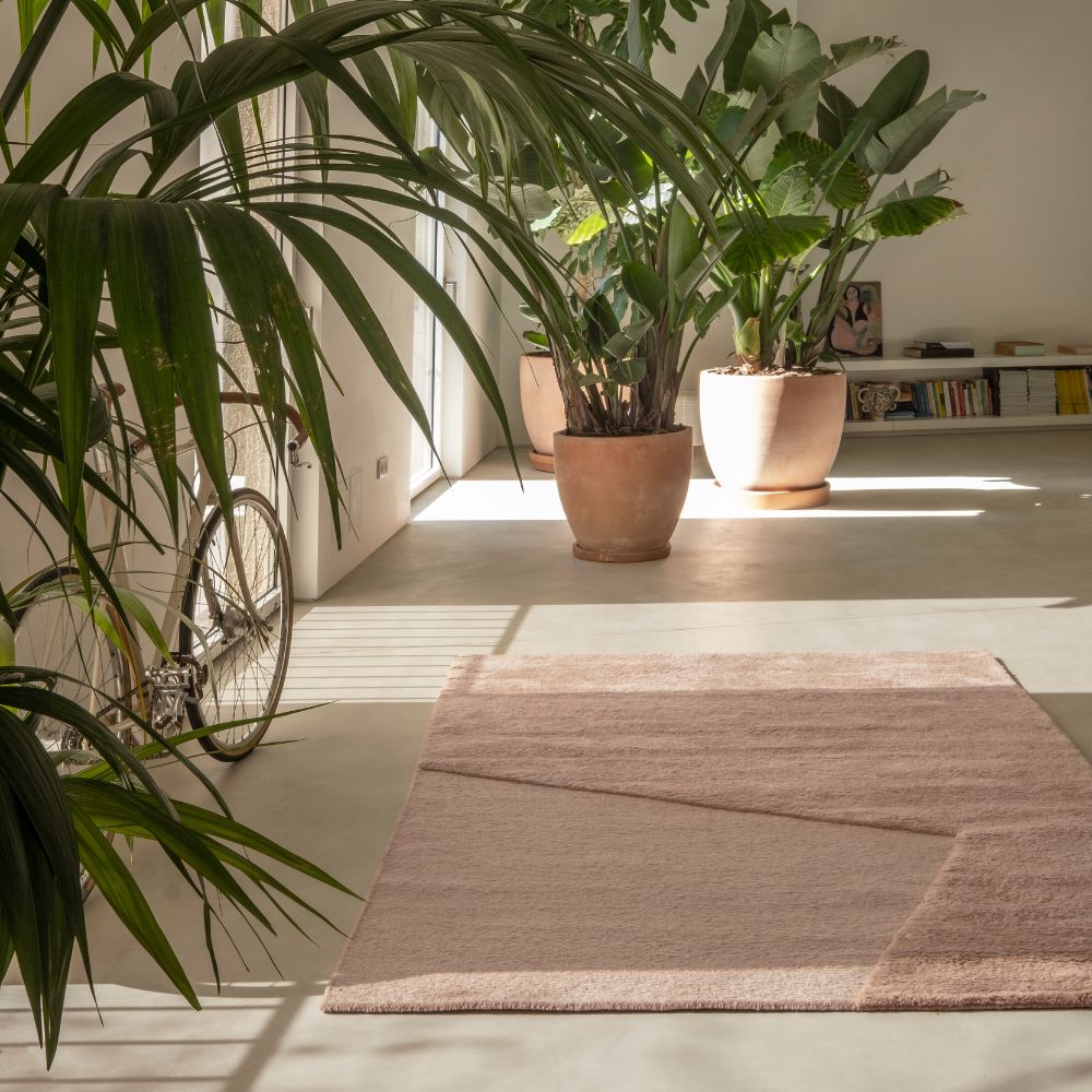 nanimarquina oblique rug pink quartz by matthew hilton in loft with plants