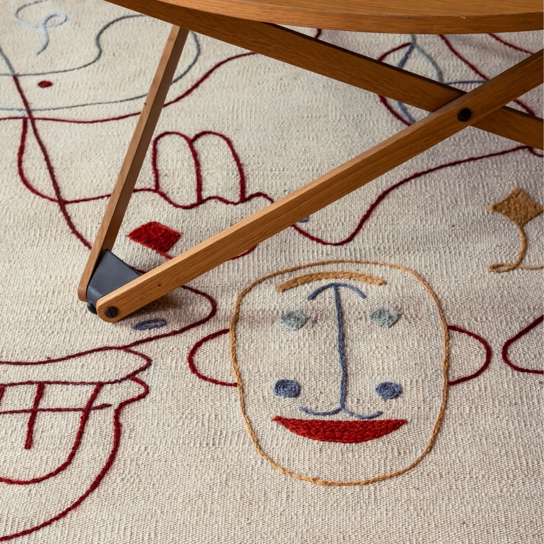 nanimarquina Silhouette Kilim by Jaime Hayon in room with Coffee Table